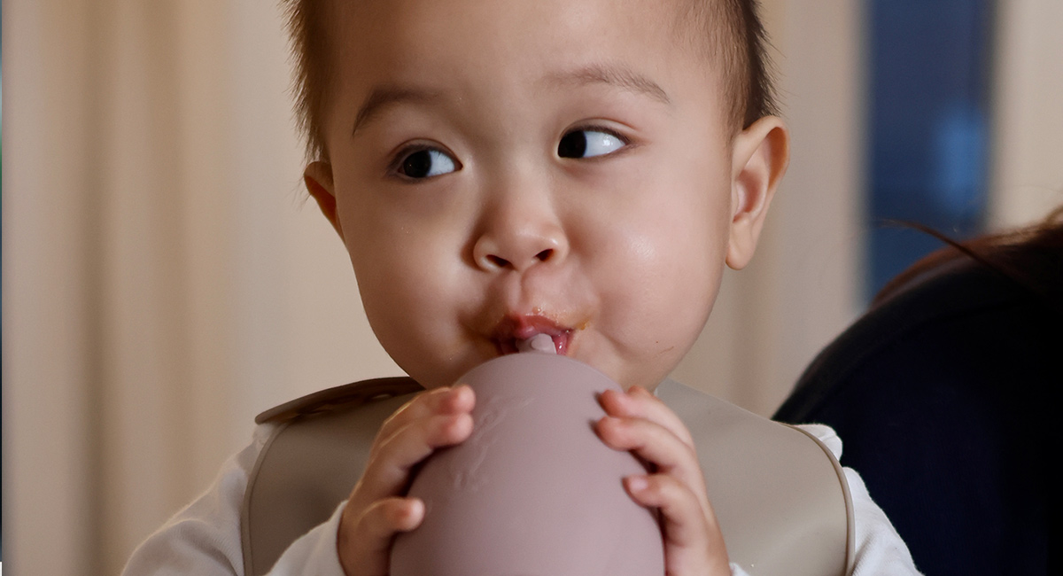 5_Banner-baby-drinking-from-cup.jpg